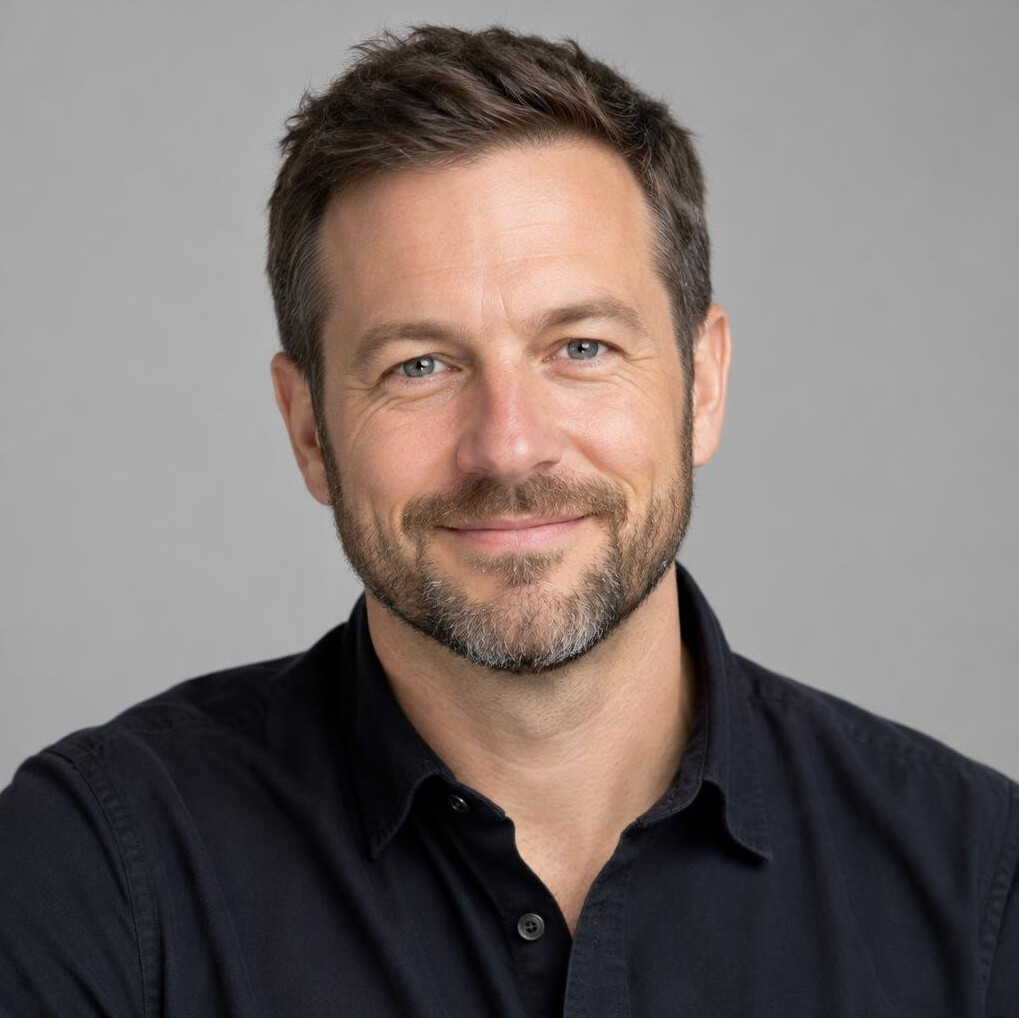 Portrait of a smiling man with a short beard
